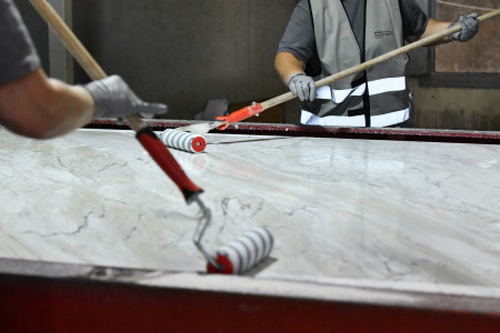 Applying resin to strengthen marbe slab