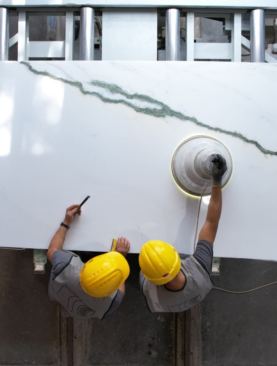 Polishing Line staff inspecting marble